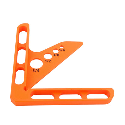 Orange L-shaped measuring tool with measurement markings on a white background