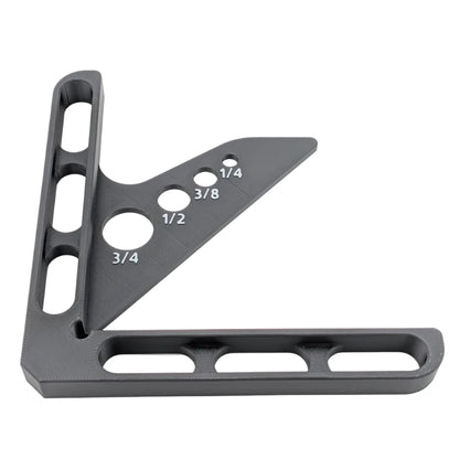 Black metal L-shaped tool with measurement markings on a white background
