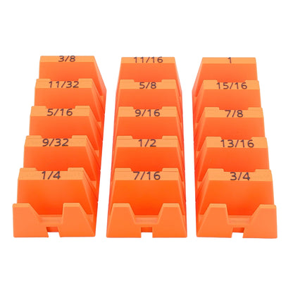 Set of orange wrench organizers with fractions labeled on a white background
