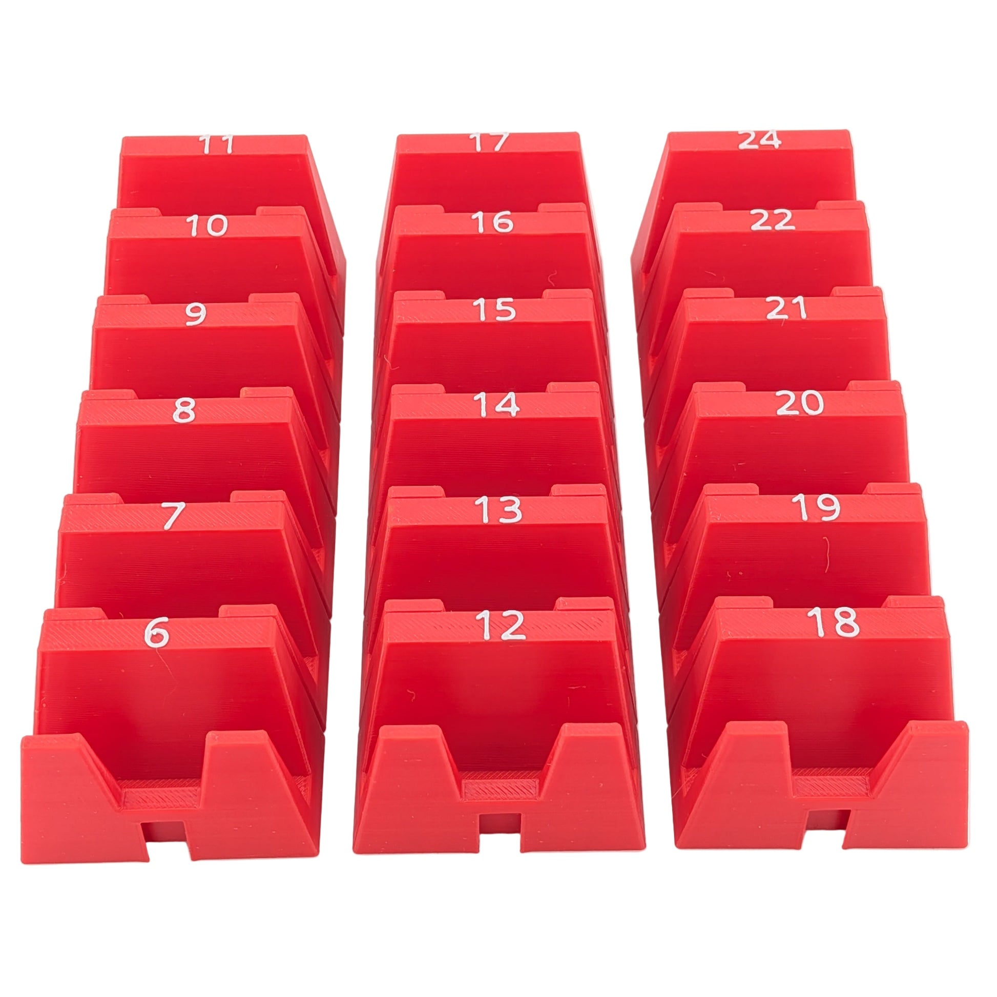 Red numbered metric wrench holders arranged in a grid on a white background